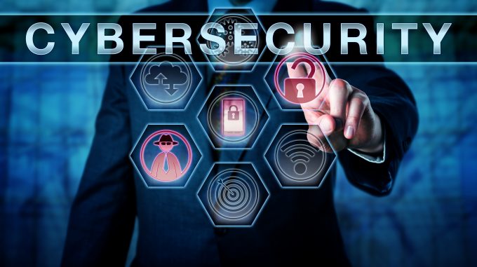 Man interacting with various cybersecurity icons, representing the defense of information from misuse and unauthorized access.
